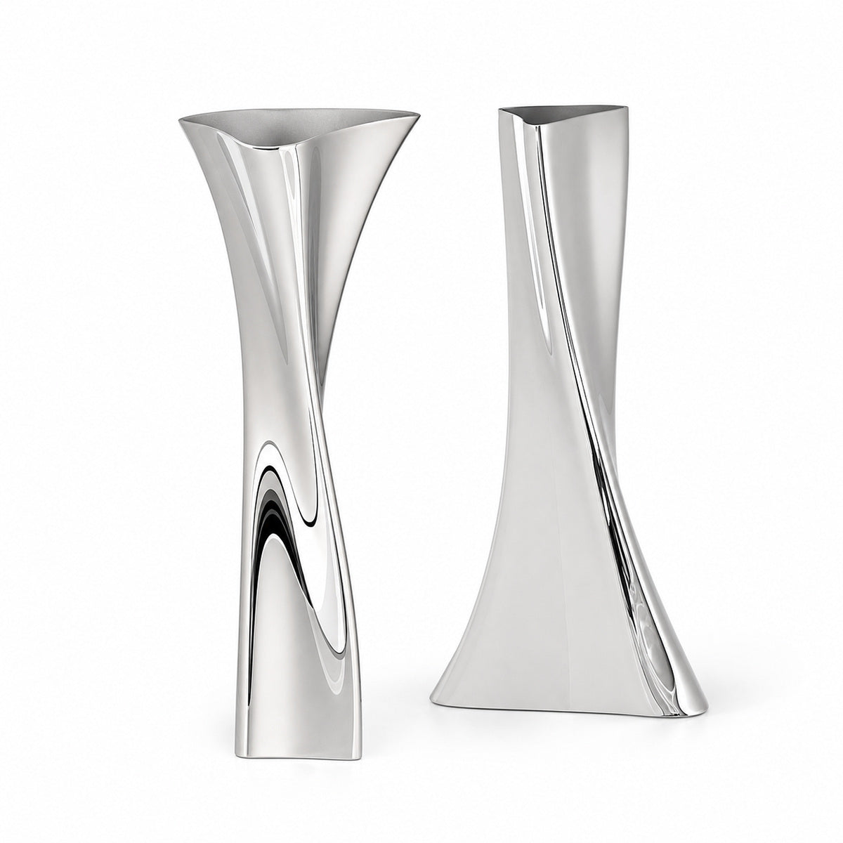 A pair of twisted geometric metallic vases, the Lumina Vase Versa set, highlighting elegant twisted contours, abstract architectural forms, and a highly reflective silver surface. The sculptural set includes two complementary designs: the 'V' model on the left with a flared top, and the 'A' model on the right with a wider base, isolated on a clean white background.